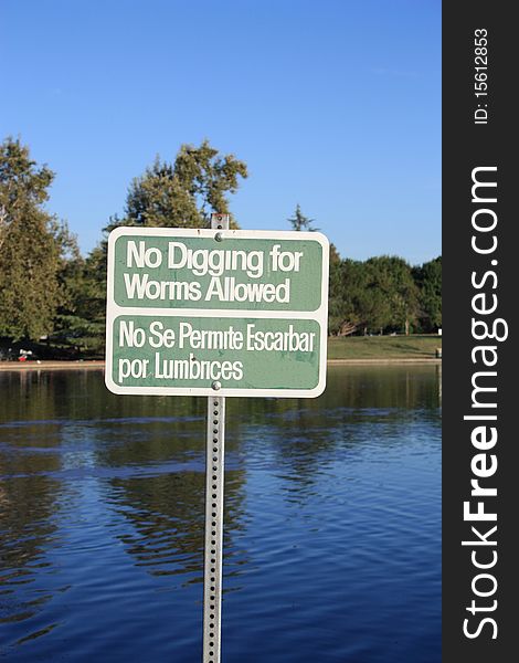 Warning Sign at a Local Lake to inform people about certain rule.