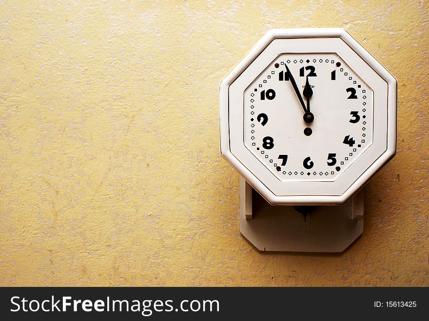Old wall clock on the wall color. Old wall clock on the wall color