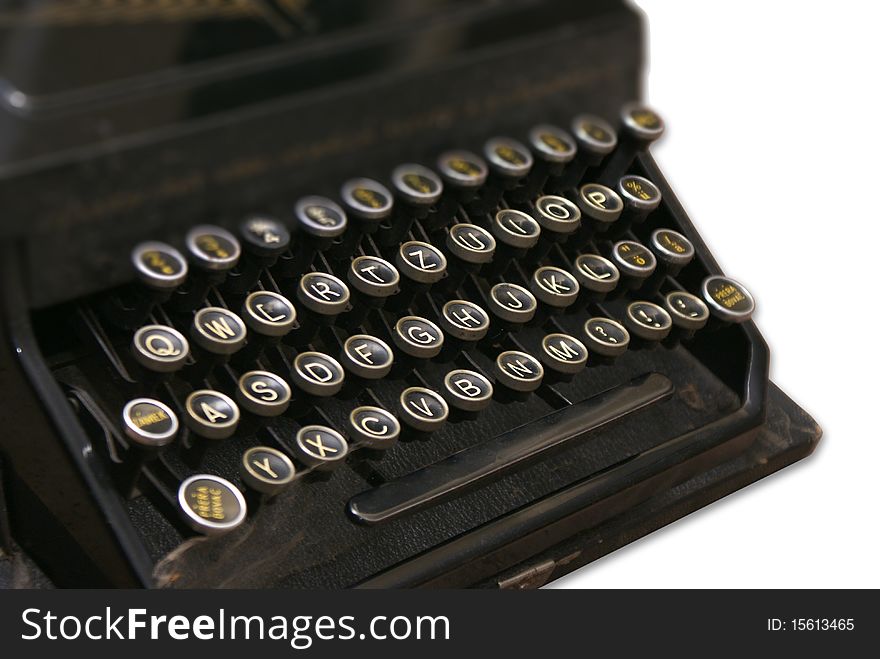 The old typewriter on a white background. The old typewriter on a white background