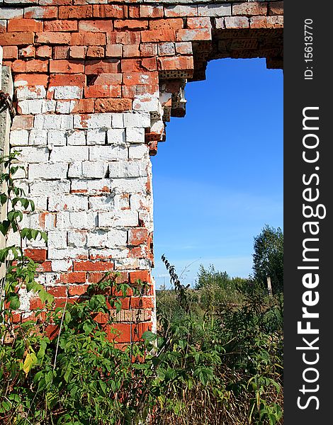 Aging brick wall on celestial background