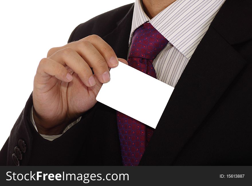 An Asian businessman pulling a card out of his coat. Clipping path included for the card. An Asian businessman pulling a card out of his coat. Clipping path included for the card.