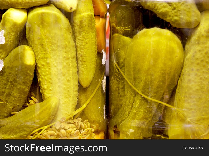 Pickles in an acidic brine