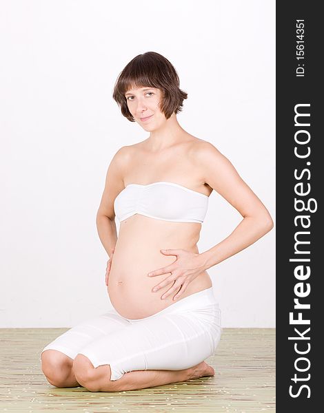 Pregnant Woman Sit On Floor
