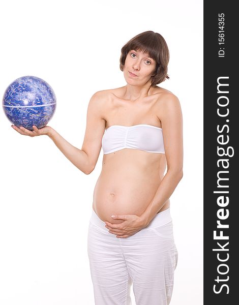 Pregnant woman in studio take look on globe of Space. Pregnant woman in studio take look on globe of Space