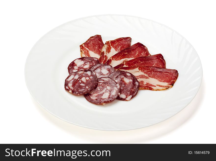 Sausage and smoked meat isolated on a white background