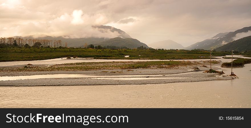 Flooded Taramakau river after storm, Arthur's Pass, New Zealand. Flooded Taramakau river after storm, Arthur's Pass, New Zealand