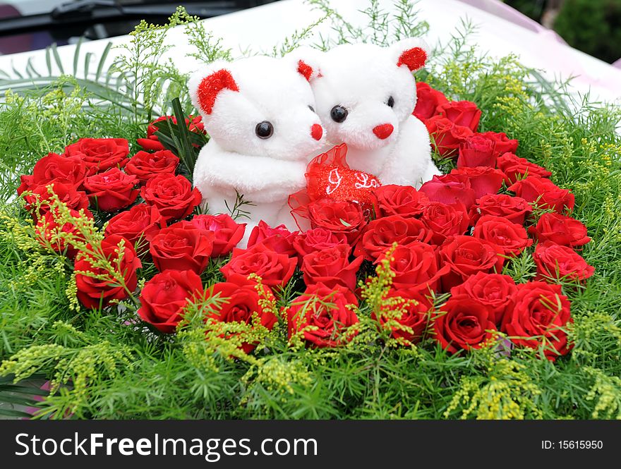 Heart-shaped rose and teddy bear. Heart-shaped rose and teddy bear