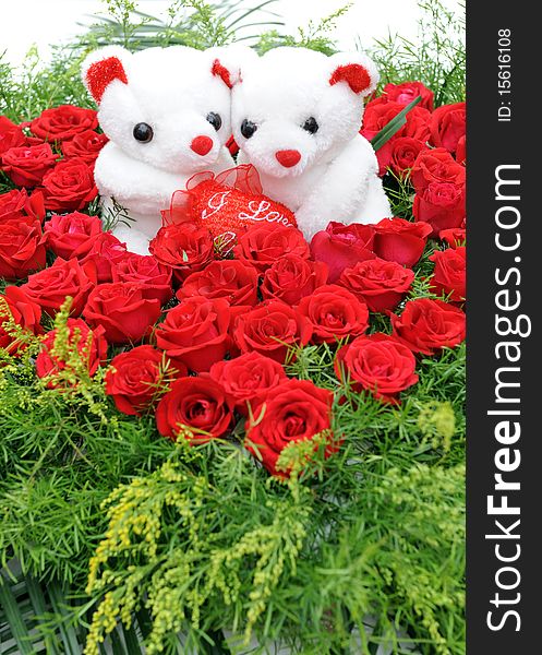 Heart-shaped rose and teddy bear. Heart-shaped rose and teddy bear