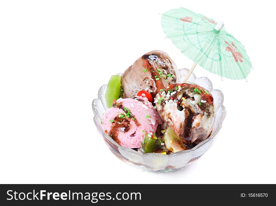 Glass cup full with fresh ice cream on white background