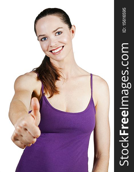 Portrait of an attractive young woman with thumbs up