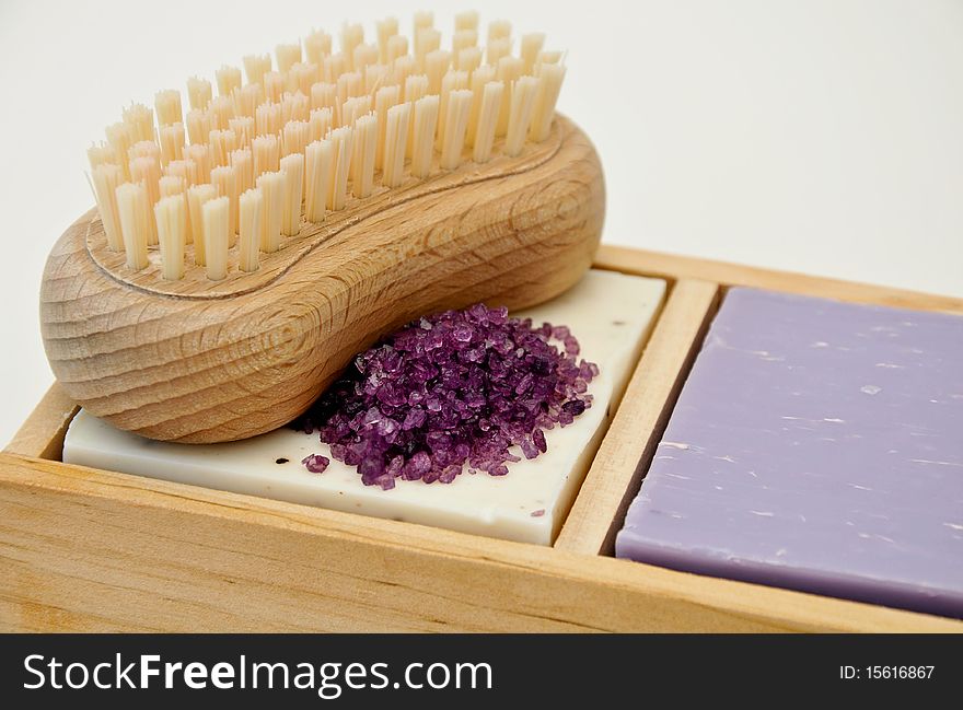 Soap bar with bath salt isolated on a white background