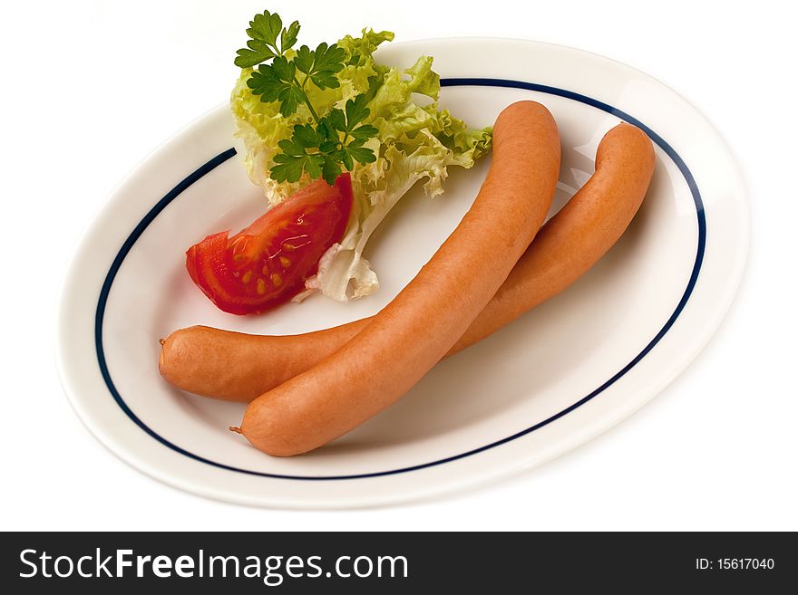 Portion of Sausage on Plate isolated on white Background