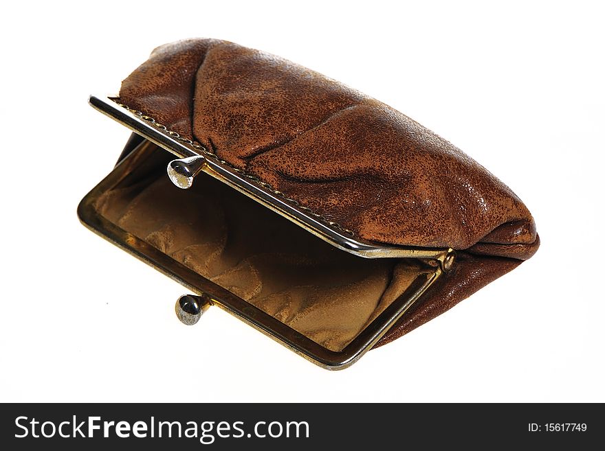 Old brown purse against on white