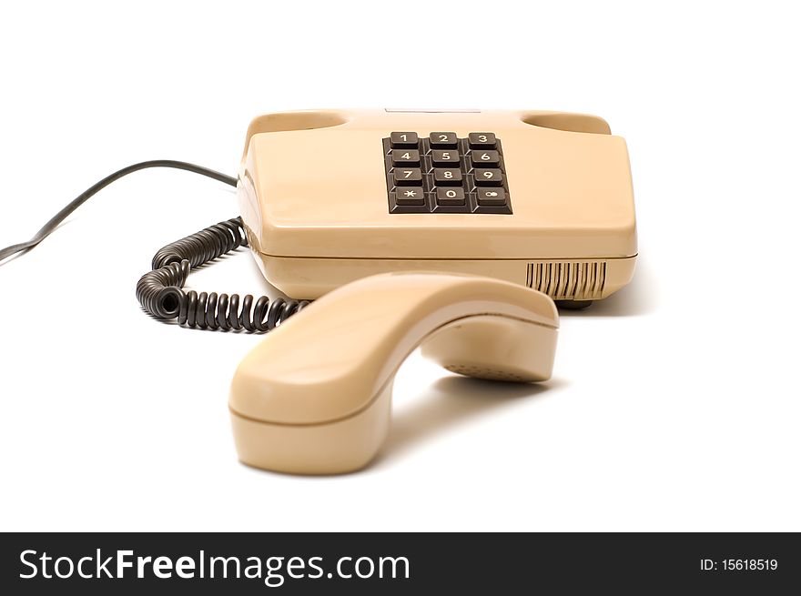 Old telephones with removed receiver isolated on a white background. Old telephones with removed receiver isolated on a white background.