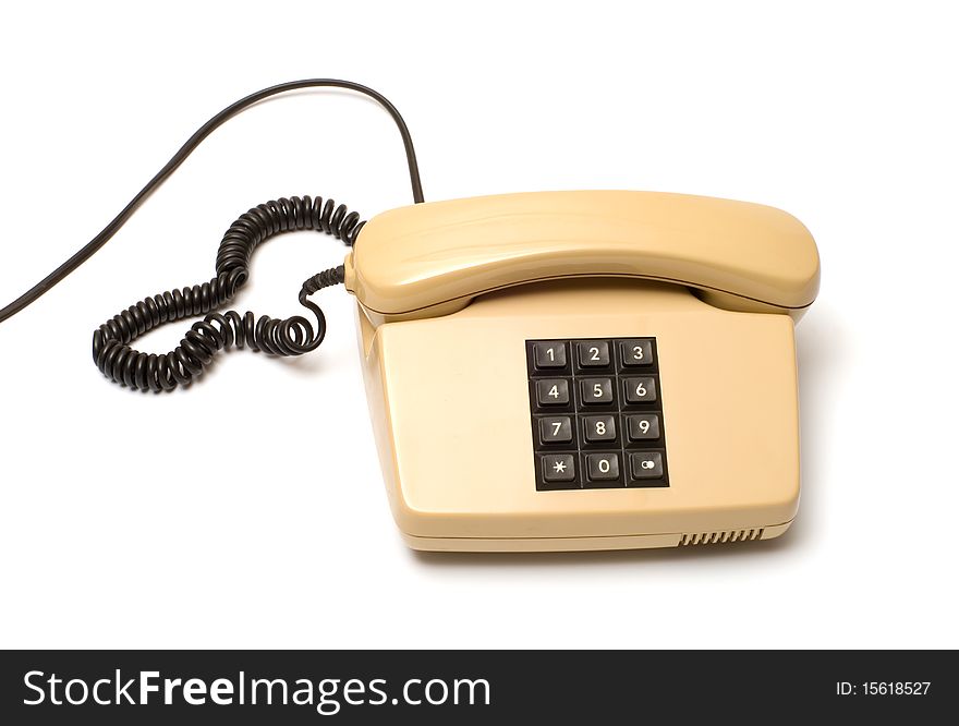 Old Beige key telephone system on a white background. Old Beige key telephone system on a white background.