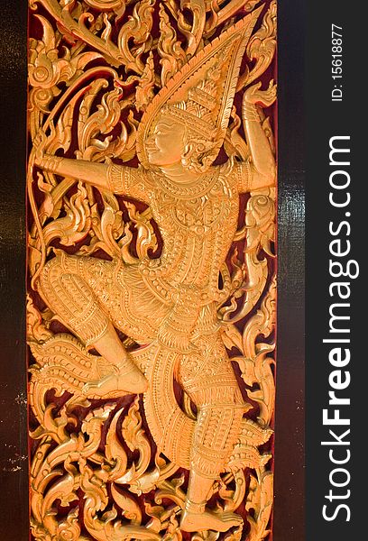 Thai carving at a wall of temple