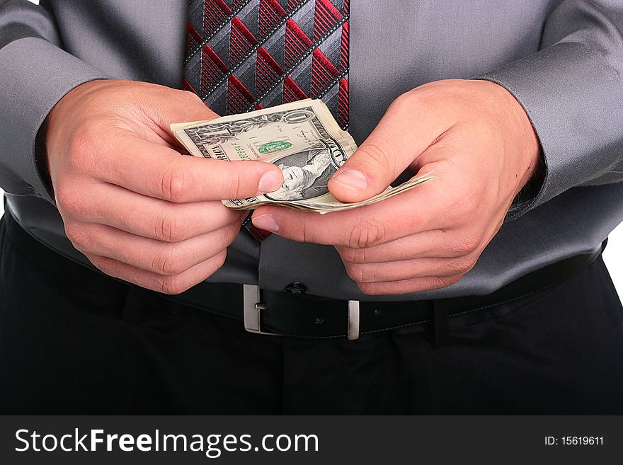 The businessman in a grey shirt and a tie has control over money. The businessman in a grey shirt and a tie has control over money.