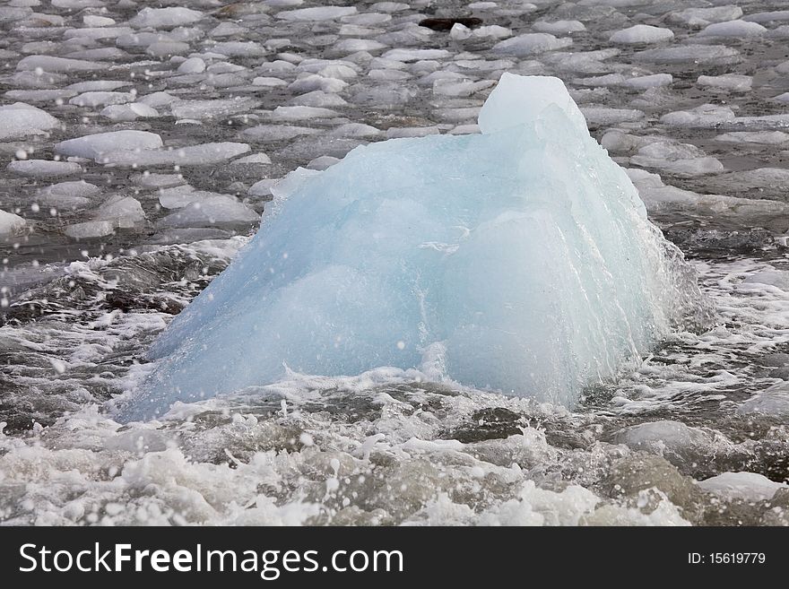 Iceberg floating in Arctic waters