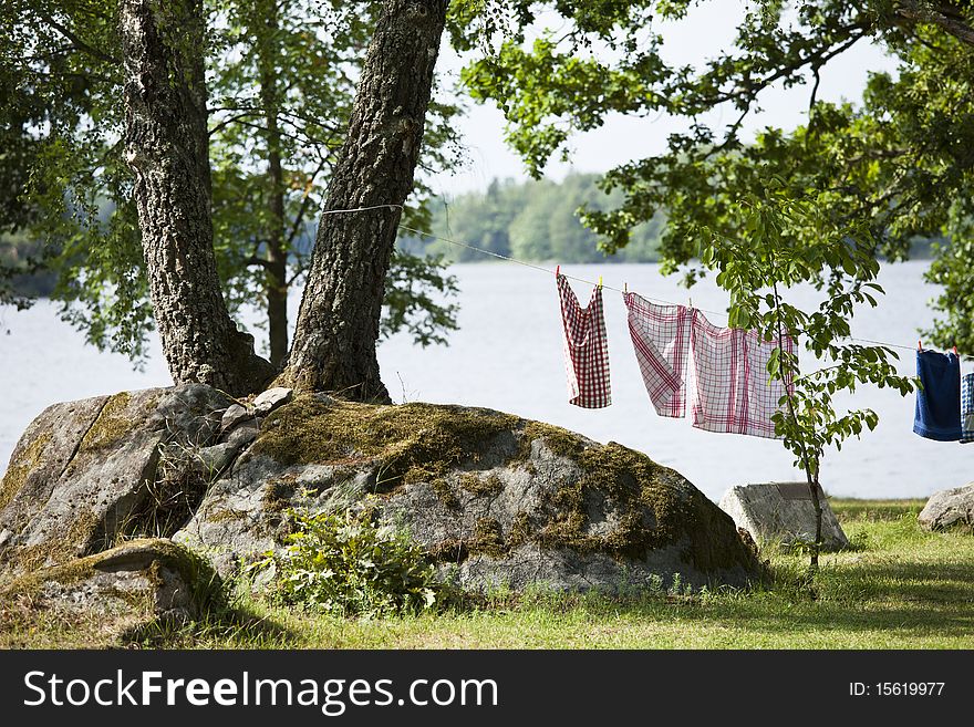 Laundry hanging on a line drying in the wind on a camp. Laundry hanging on a line drying in the wind on a camp.