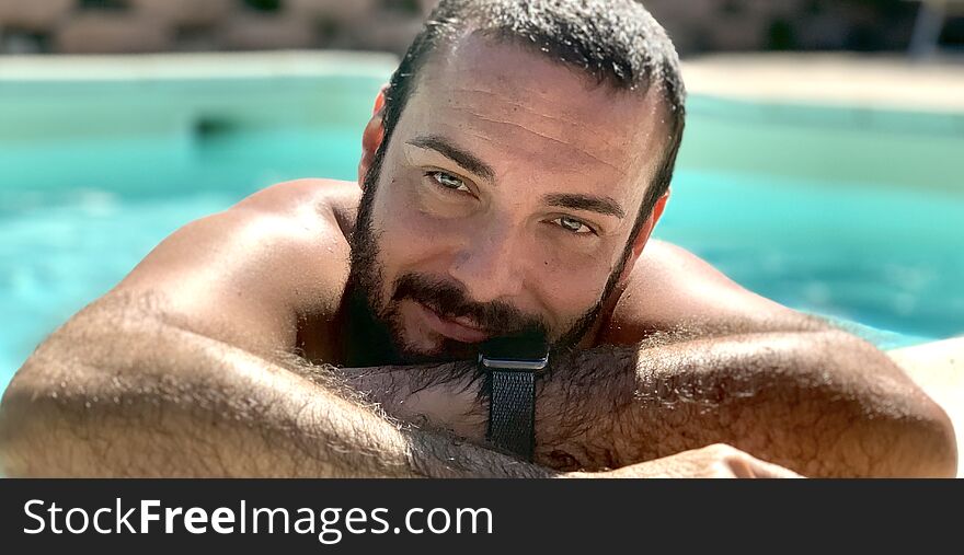 Italian boy in the pool while relaxing. Italian boy in the pool while relaxing