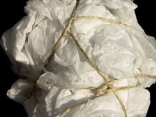 Free Untidy Parcel Of Tissue Paper Tied With String Royalty Free Stock Photos - 15621528
