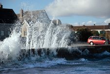 Waves Crashing Against Coastal Wall Royalty Free Stock Photo