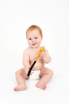 The Child With A Spoon In Hands Stock Image