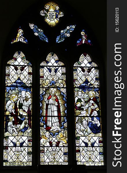 Historic stained glass window, christian theme. Historic stained glass window, christian theme.