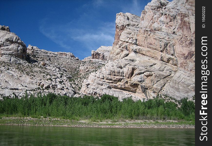 Beautiful sky breaks through the canyon wall on a river. Beautiful sky breaks through the canyon wall on a river