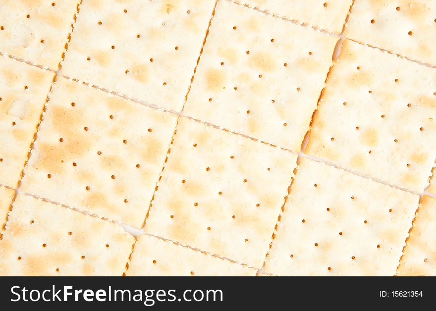 Saltine crackers arranged to create a repeating pattern. Saltine crackers arranged to create a repeating pattern