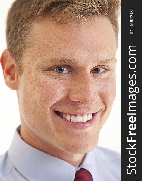 Portrait of confident young businessman smiling