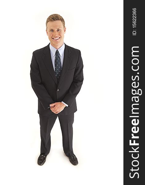 Full length portrait of young businessman standing. Full length portrait of young businessman standing