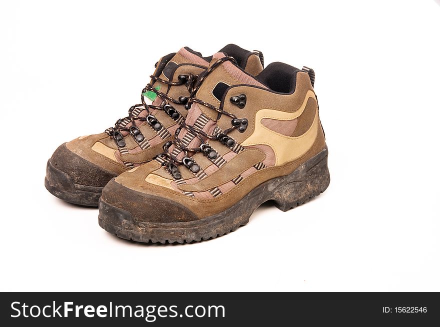 Close up photo of hiking boots on white background