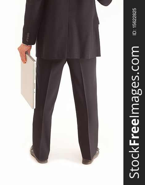 Back of businessman holding laptop