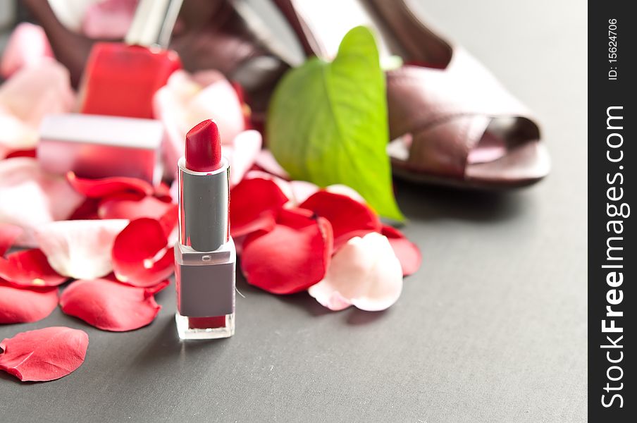 Lipstick with Scattered Rose Petals ( Fashion Concept )