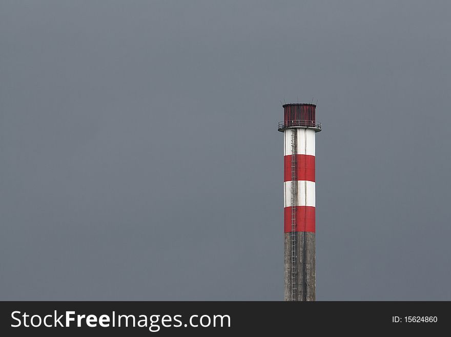 Coloured chimney with grey sky