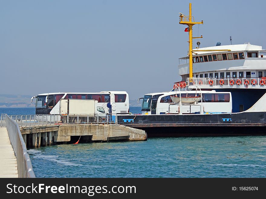 Modern buses transported by ferry boat. Modern buses transported by ferry boat