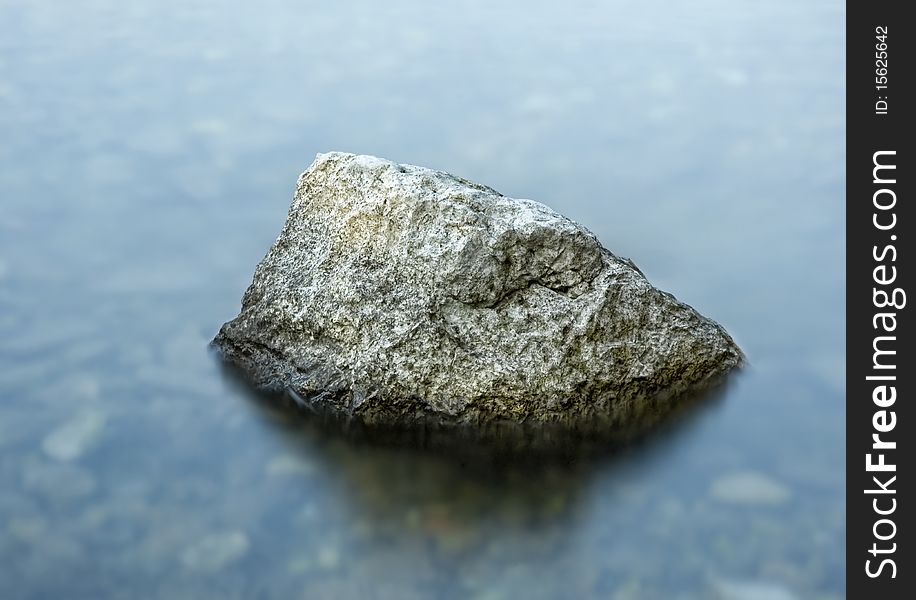 Isolated rock in the sea. Isolated rock in the sea