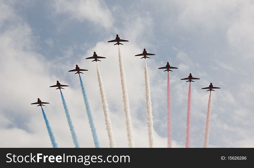 The world famous Royal air force Red arrows aerobatic flying team in action.