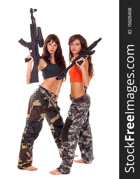 Image of a two armed paintball players posing to the camera. Image of a two armed paintball players posing to the camera