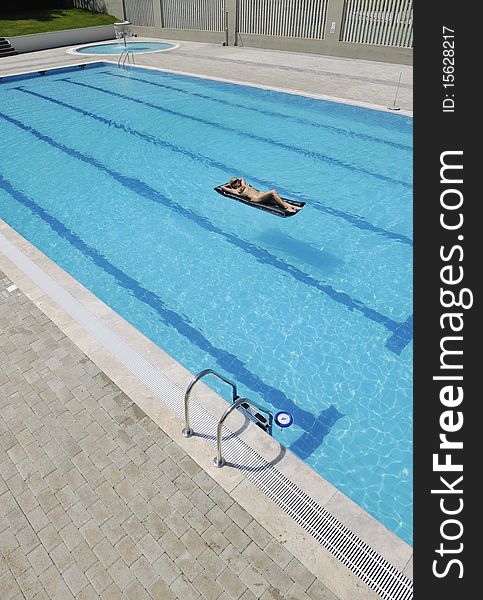 Woman Relax On Swimming Pool