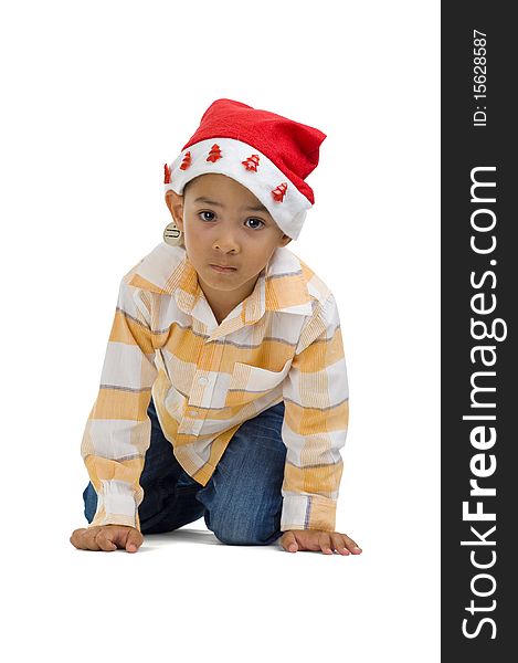 Cute boy with santa claus hat, isolated on white background