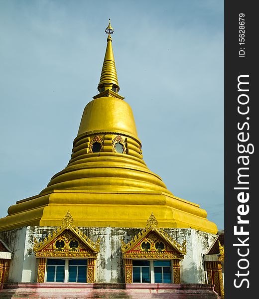 Golden pagoda in evening sky. Golden pagoda in evening sky