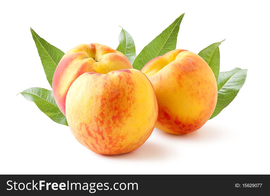 Three peaches on a white backgroundand with soft shadow