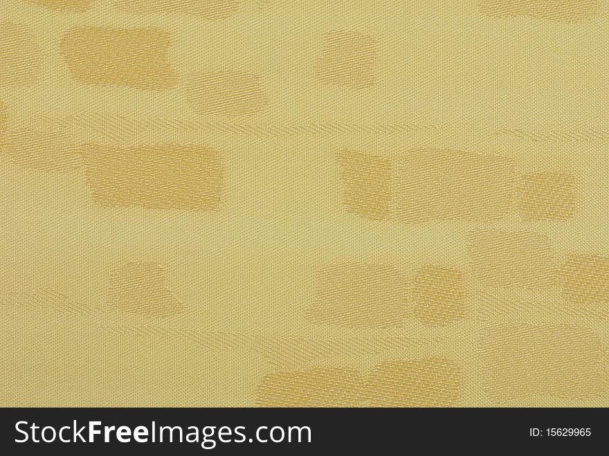 Studio shot of the textured yellow fabric