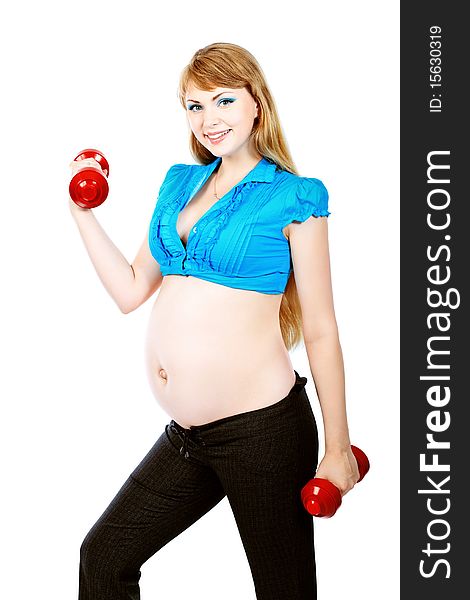 Portrait of pregnant woman training with dumbbells. Isolated over white background. Portrait of pregnant woman training with dumbbells. Isolated over white background.