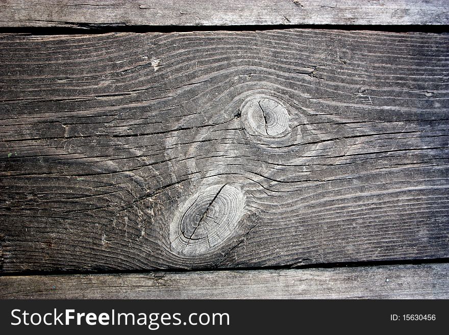 Old wooden boards with knots