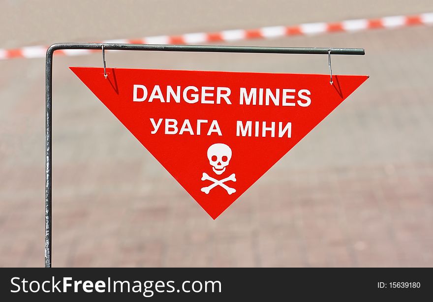 Warning sign on mined area in the city street