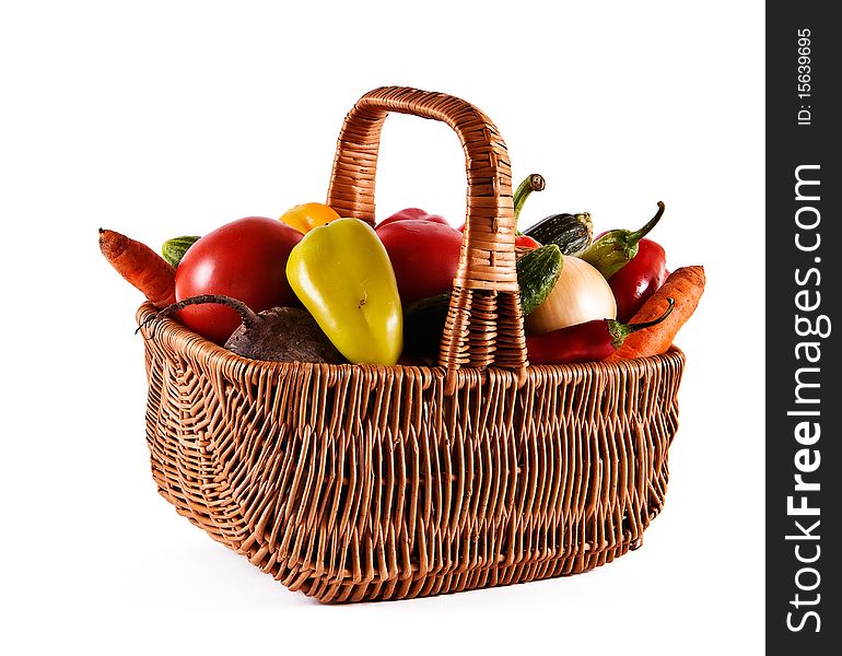 Basket filled with fresh vegetables from a kitchen garden. Basket filled with fresh vegetables from a kitchen garden