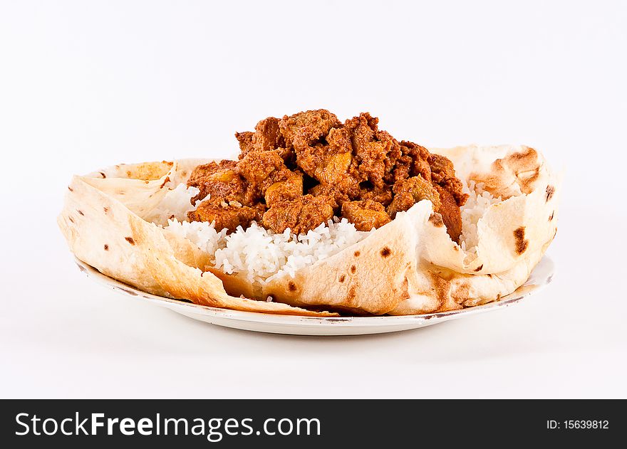 Rice and pork prepared in  Indian style